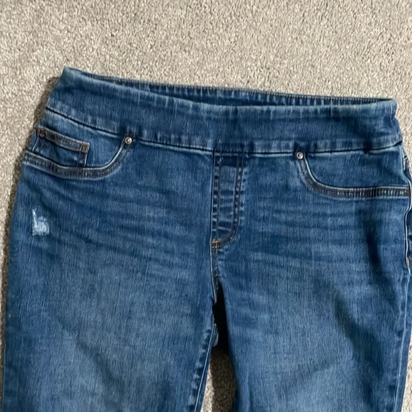 Chicos Jenning Ankle jeans with snaps on the bottom and designer “worn” places - Picture 4 of 11
